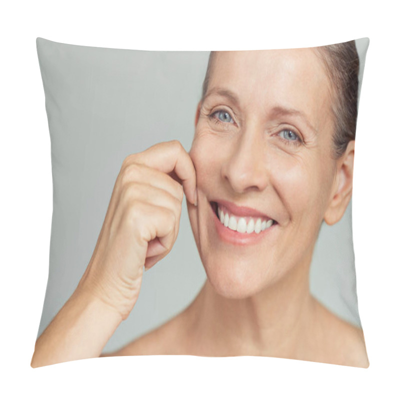 Personality  Senior Woman Pulling Cheeks To Feel Softness And Looking At Camera. Beauty Portrait Of Happy Mature Woman Smiling With Hands On Cheek Isolated Over Grey Background. Aging Process And Perfect Skin Concept. Pillow Covers