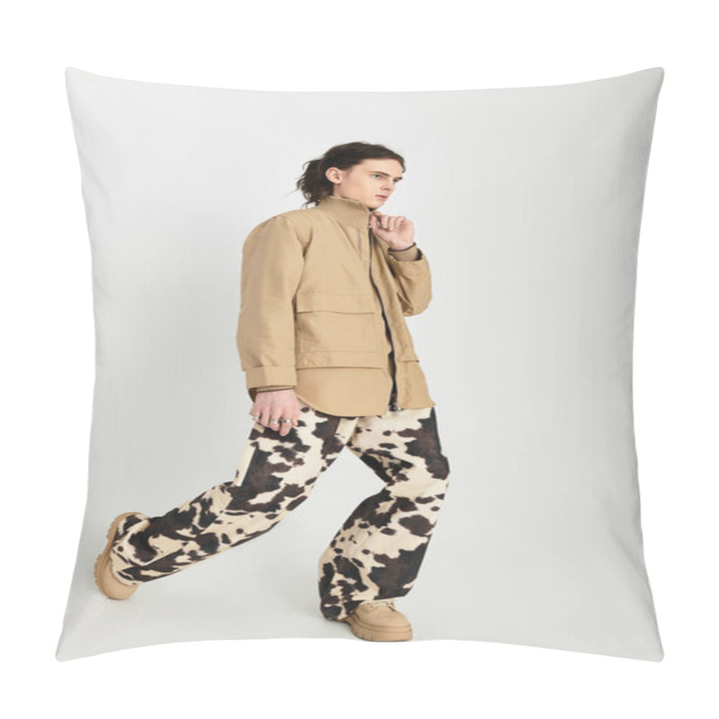 Personality  A Handsome Young Man Poses Confidently In A Neutral Toned Outfit With Bold Designs, Exuding Style. Pillow Covers