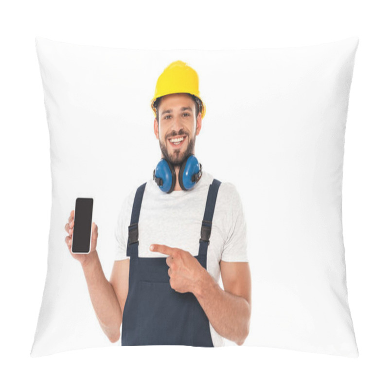 Personality  Smiling Workman In Uniform And Protective Helmet Pointing With Finger At Smartphone Isolated On White Pillow Covers