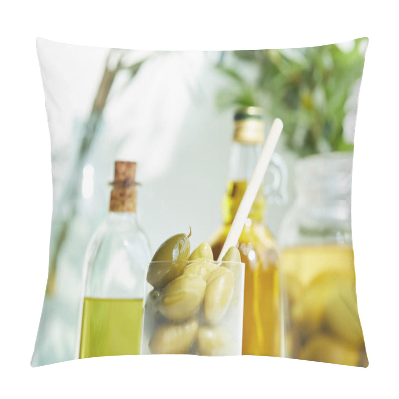 Personality  Closeup Shot Of Glass With Spoon And Green Olives, Jar, Various Bottles Of Aromatic Olive Oil With And Branches On Wooden Tray Pillow Covers