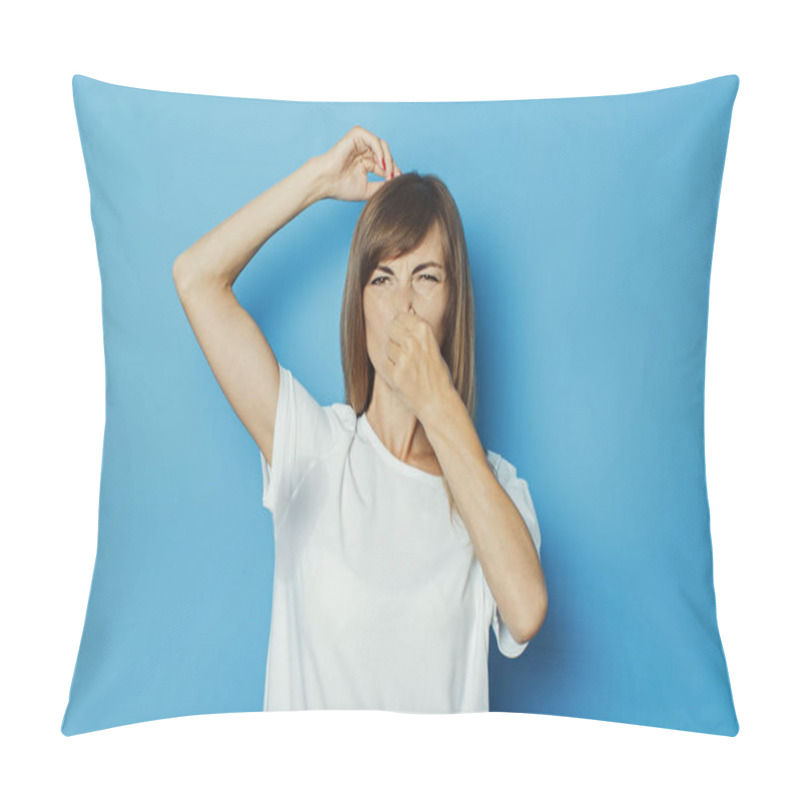 Personality  Young Girl In A White T-shirt With Wet Armpits From Sweat On A Blue Background. Concept Of Excessive Sweating, Heat, Deodorant Pillow Covers