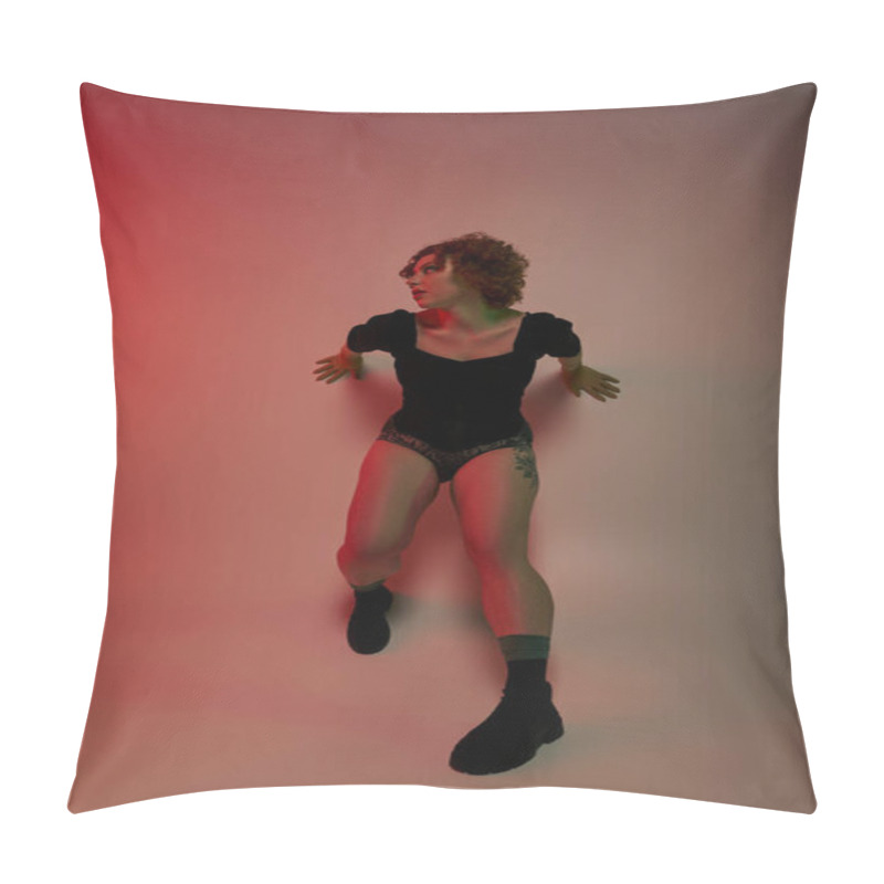 Personality  A Young Curvy Redhead Woman In A Bodysuit Dancing Energetically In Front Of A Striking Red Background. Pillow Covers