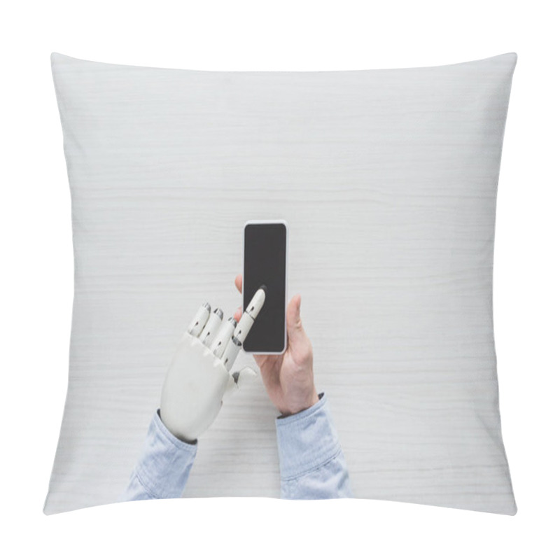 Personality  Cropped Image Of Man With Cyborg Hand Using Smartphone With Blank Screen Over Wooden Table  Pillow Covers