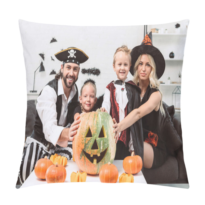 Personality  Portrait Of Smiling Family In Various Halloween Costumes At Coffee Table With Pumpkins At Home Pillow Covers