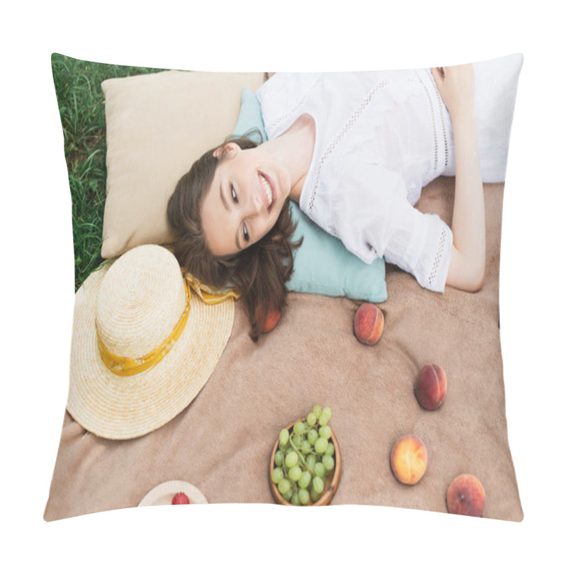 Personality  Top View Of Positive Woman Looking At Fresh Fruits Near Straw Hat On Picnic Blanket  Pillow Covers