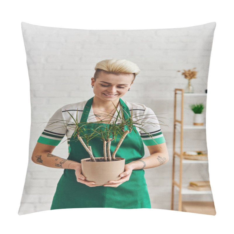 Personality  Overjoyed Tattooed Woman With Trendy Hairstyle Holding Potted Exotic Plant While Standing In Green Apron In Modern Living Room, Plant Therapy, Sustainable Home Decor And Green Living Concept Pillow Covers