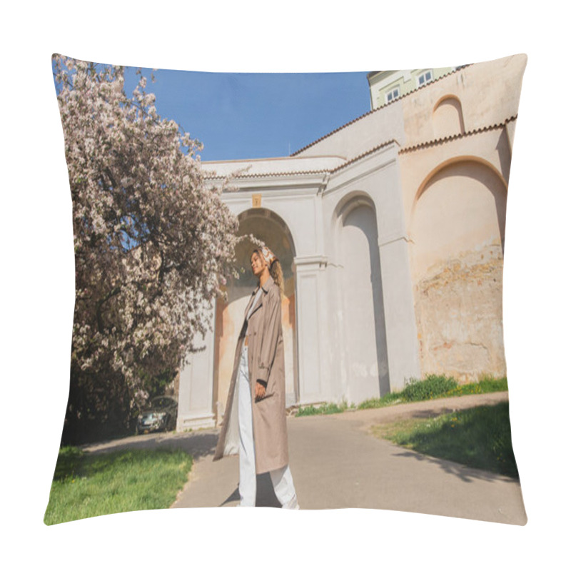 Personality  Full Length Of African American Woman In Stylish Trench Coat Standing Near Blooming Tree In Prague Pillow Covers