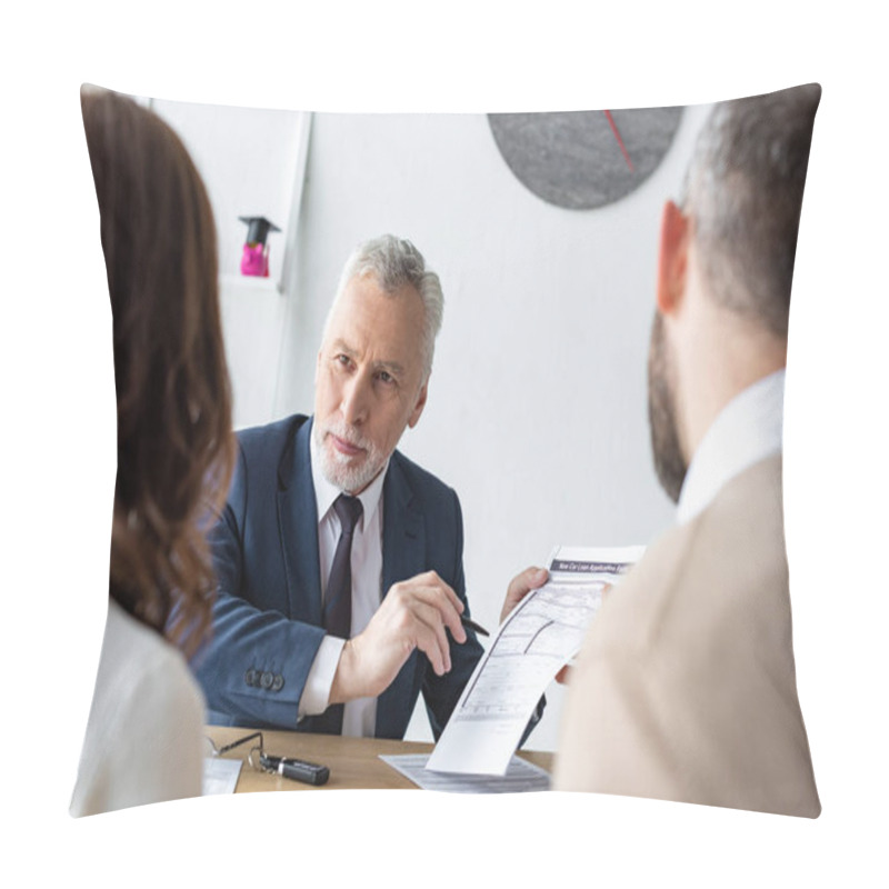 Personality  Selective Focus Of Bearded Car Dealer Holding Contract And Pen Near Customers  Pillow Covers