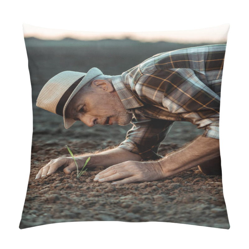 Personality  Selective Focus Of Self-employed Senior Farmer Looking At Small Plant In Ground  Pillow Covers