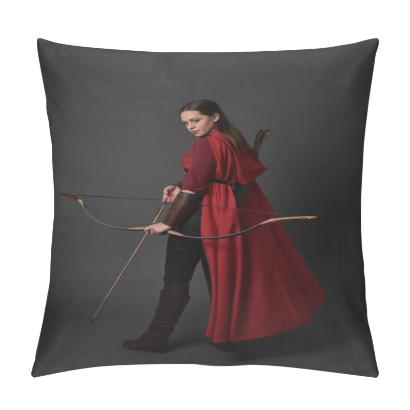 Personality  Full Length Portrait Of Brunette Girl Wearing Red Medieval Costume And Cloak, Holding A Bow And Arrow. Standing Pose On Grey Studio Background. Pillow Covers