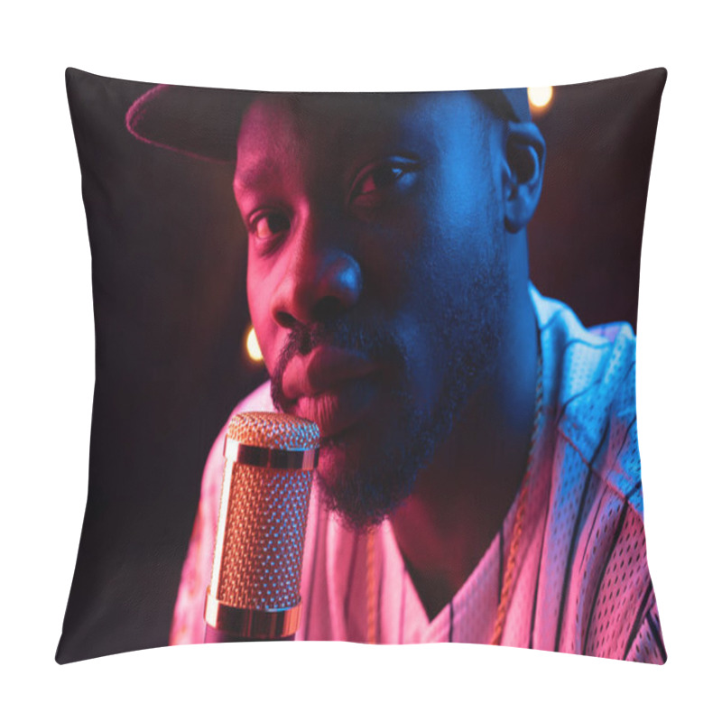 Personality  Close-up Portrait Of Young Male Soul Singer With Microphone. Pink Neon Light Pillow Covers