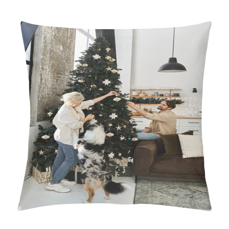 Personality  A Loving Couple Adds Ornaments To A Christmas Tree While Their Dog Watches Eagerly At Home. Pillow Covers