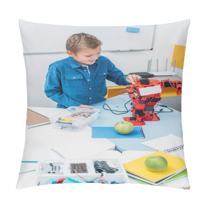 Personality  Happy Schoolboy Working On Handmade Robot Model During STEM Lesson   Pillow Covers