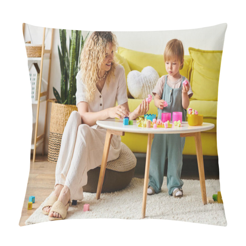 Personality  A Curly-haired Mother And Her Toddler Daughter Engage In Montessori Activities In A Cozy Living Room Setting. Pillow Covers