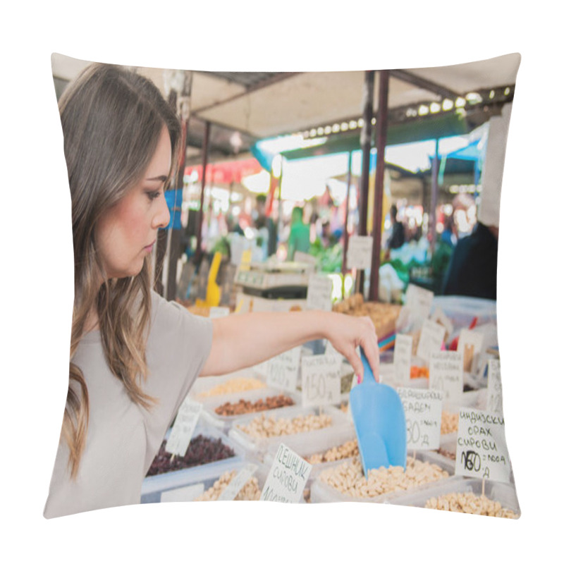 Personality  Woman Chooses In The Market Nuts And Dried Fruit. Smiling Young  Woman Choosing Organic Nuts. Woman Buying Various Nuts By Weight In Grocery Shop Pillow Covers