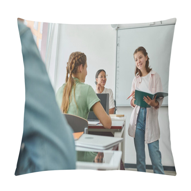 Personality  Positive Teen Schoolgirl Holding Notebook Near Classmate And African American Teacher In Classroom Pillow Covers