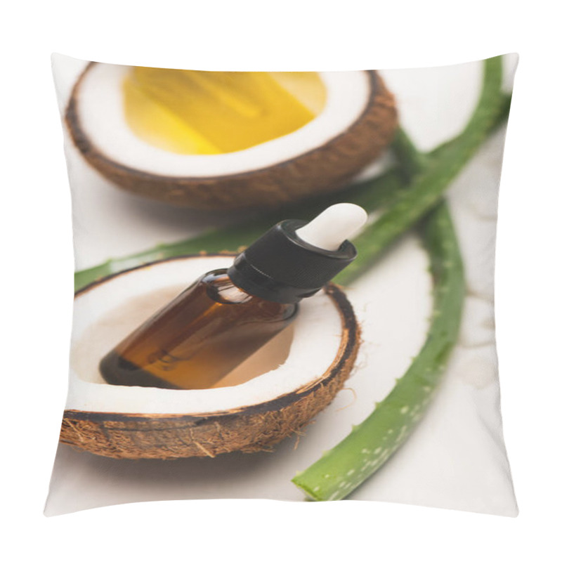 Personality  Bottles Of Essential Oils In Coconut Halves Near Aloe Vera Leaves On White Blurred Background Pillow Covers