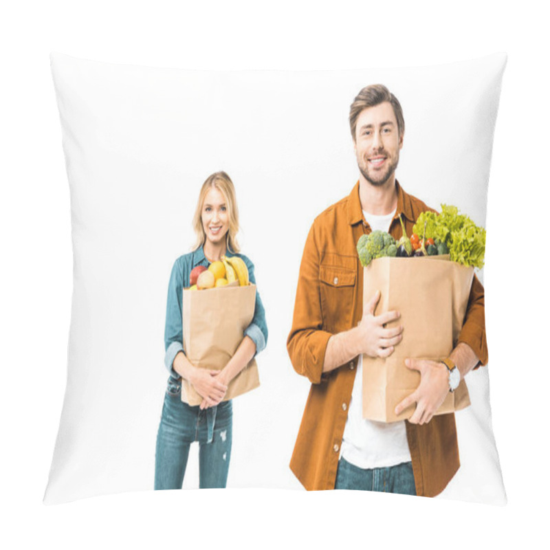 Personality  Handsome Smiling Man Holding Shopping Bag With Products While His Girlfriend Standing Behind Isolated On White Pillow Covers