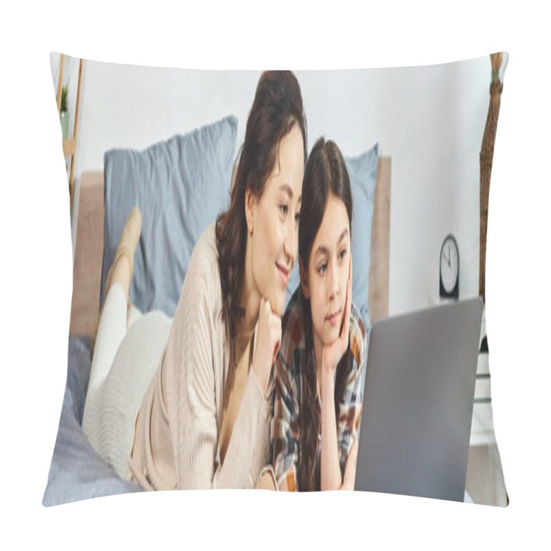 Personality  A Mother And Daughter Lie On A Bed Together, Engaged With A Laptop Screen. Pillow Covers