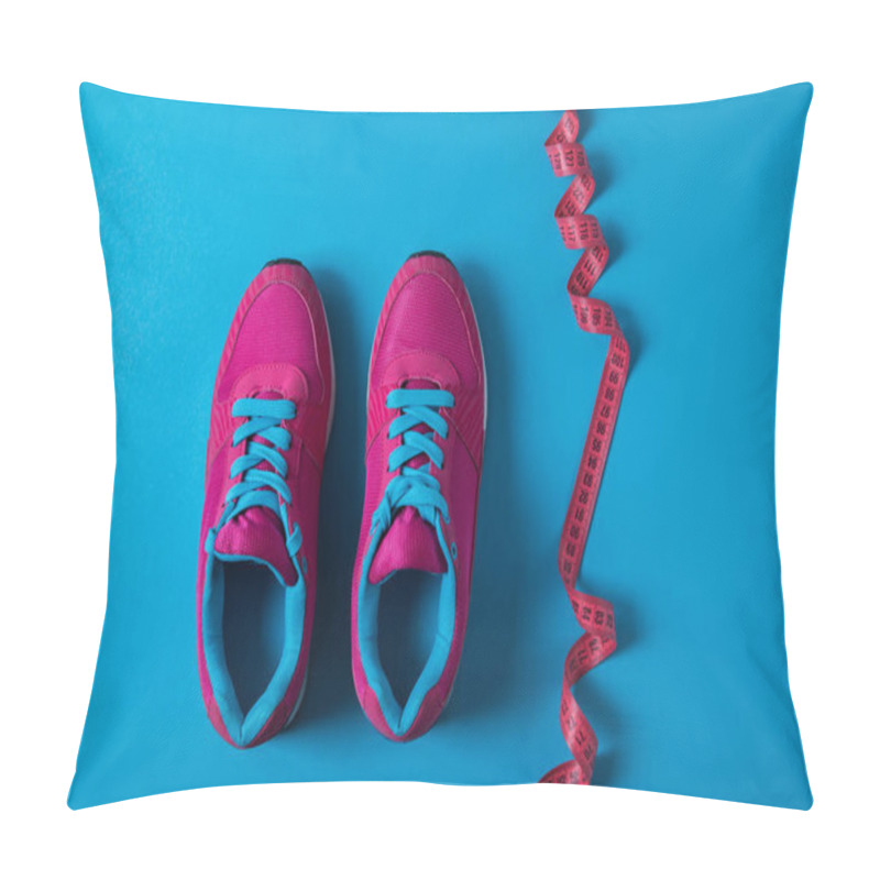 Personality  View From Above Of Pink Sport Shoes And Measuring Tape Isolated On Blue, Minimalistic Concept  Pillow Covers