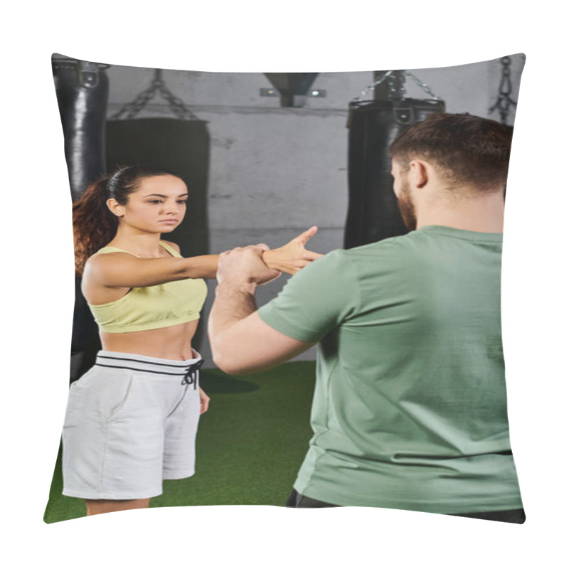 Personality  A Male Trainer Guides A Woman In Learning Self-defense Techniques In A Gym Setting With Focus And Determination. Pillow Covers