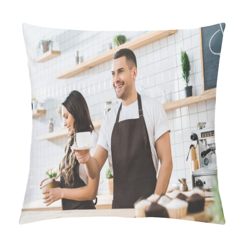 Personality  Handsome Cashier Holding Cup And Saucer Wile Attractive Brunette Barista Closing Paper Cup In Coffee House Pillow Covers