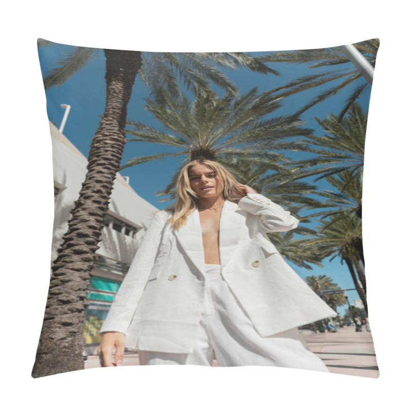 Personality  A Stunning Blonde Woman In A White Suit Stands Gracefully Next To A Vibrant Palm Tree In Miami. Pillow Covers