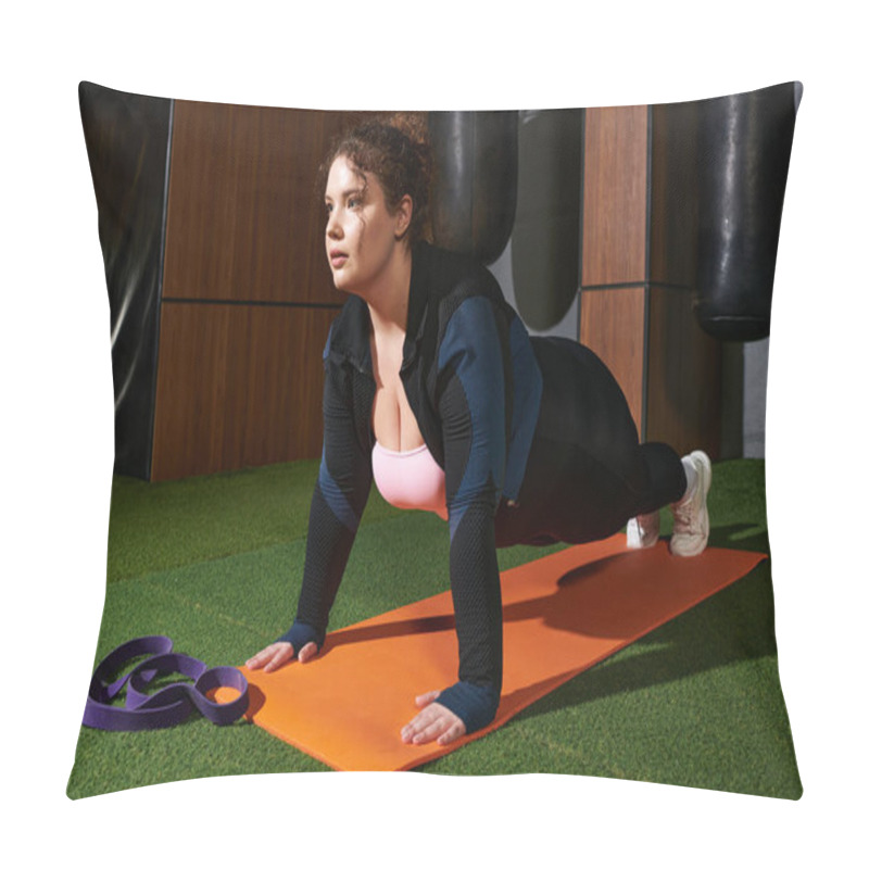 Personality  Person Performs Intense Push Ups Using An Exercise Mat And Resistance Bands. Pillow Covers