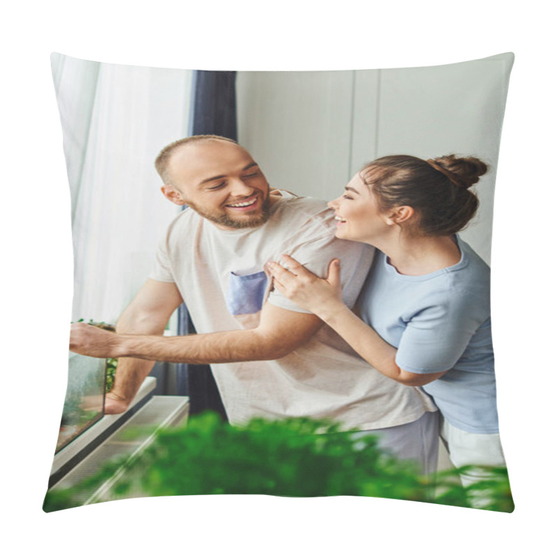 Personality  Smiling Couple In Homewear Looking At Each Other While Standing Near Terrarium At Home Pillow Covers