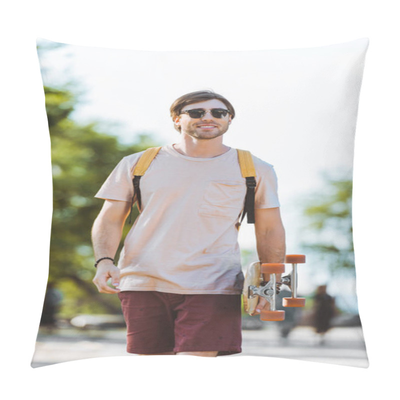 Personality  Portrait Of Young Man In Sunglasses With Backpack And Longboard Walking On Street Pillow Covers