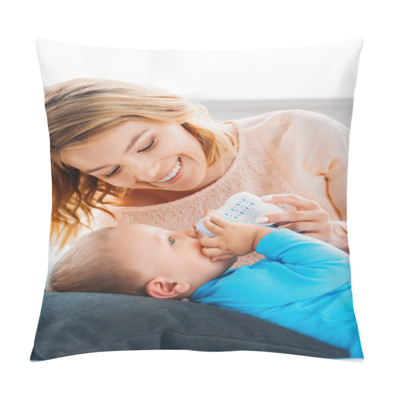 Personality  Smiling Mother Feeding Her Little Child With Baby Bottle On Bed At Home Pillow Covers