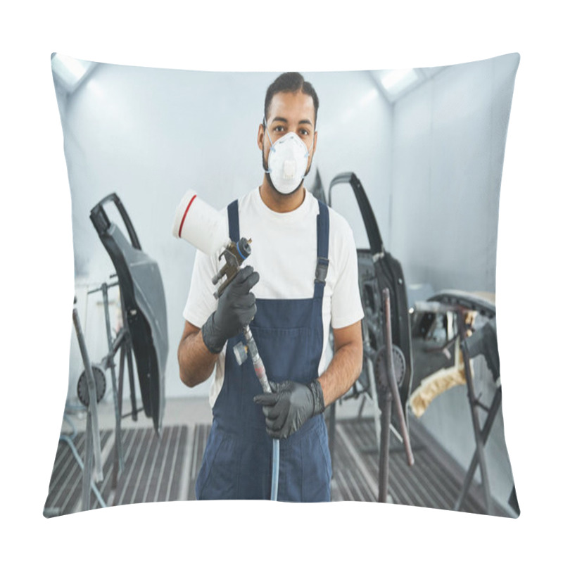 Personality  Handsome Mechanic Wearing A Mask And Gloves Prepares To Paint Car Parts In A Workshop. Pillow Covers