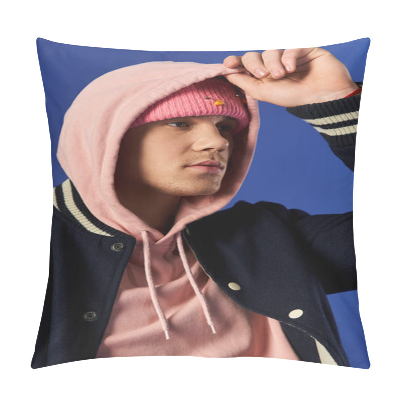 Personality  Handsome Young Man Adjusts His Pink Hat Against A Striking Blue Backdrop. Pillow Covers