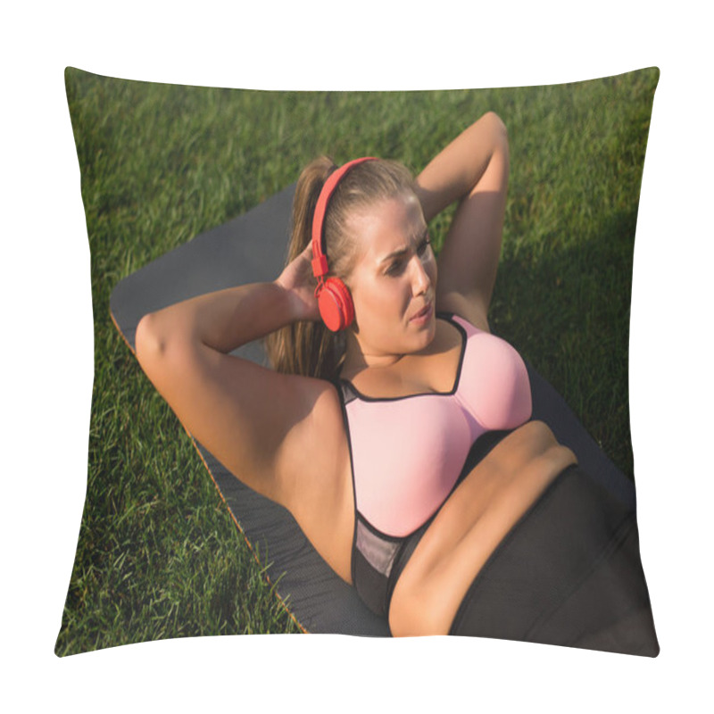 Personality  Young Pretty Plus Size Woman In Pink Sporty Top And Leggings With Red Headphones Hardly Shakes Press On Yoga Mat In City Park Pillow Covers