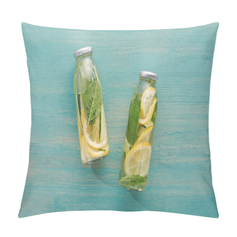 Personality  Top View Of Detox Drink In Bottles With Lemon And Cucumber Slices, Mint Leaves On Blue Wooden Surface Pillow Covers