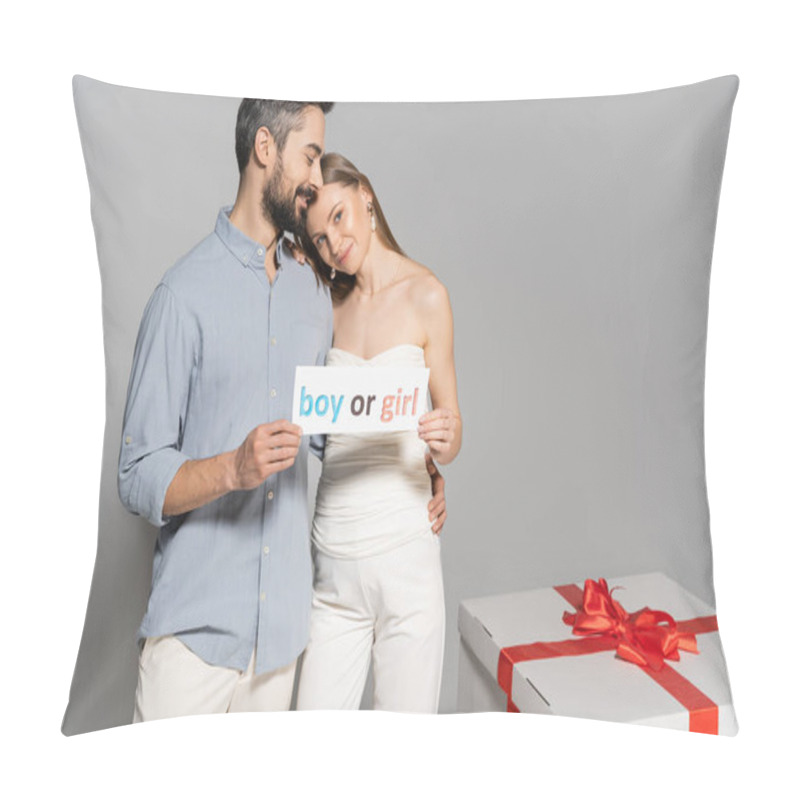 Personality  Smiling And Stylish Man Hugging Pregnant Wife And Holding Card With Boy Or Girl Lettering Near Big Gift Box During Gender Reveal Surprise Party On Grey Background, Expecting Parents Concept Pillow Covers