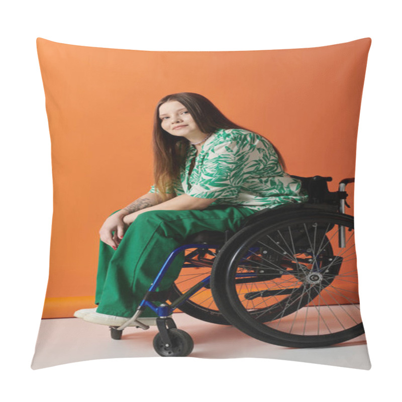 Personality  A Confident Young Woman With Long Brown Hair, In Green Floral Shirt And Pants, Sits In Wheelchair Against Orange Background. Pillow Covers