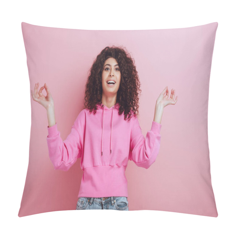 Personality  Cheerful Bi-racial Girl Looking At Camera While Standing In Meditation Pose On Pink Background Pillow Covers