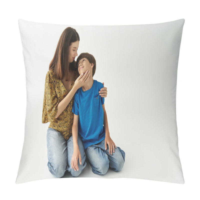 Personality  A Young Mother Kneels Beside Her Son, Sharing A Loving Moment In A Bright Studio. Pillow Covers