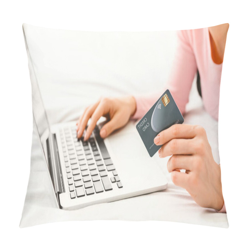 Personality  A Woman Laying On Bed, Focused On Her Laptop Screen, Holding A Credit Card In Her Hand. She Is Likely Making An Online Purchase Or Checking Her Financial Information, Cropped Pillow Covers