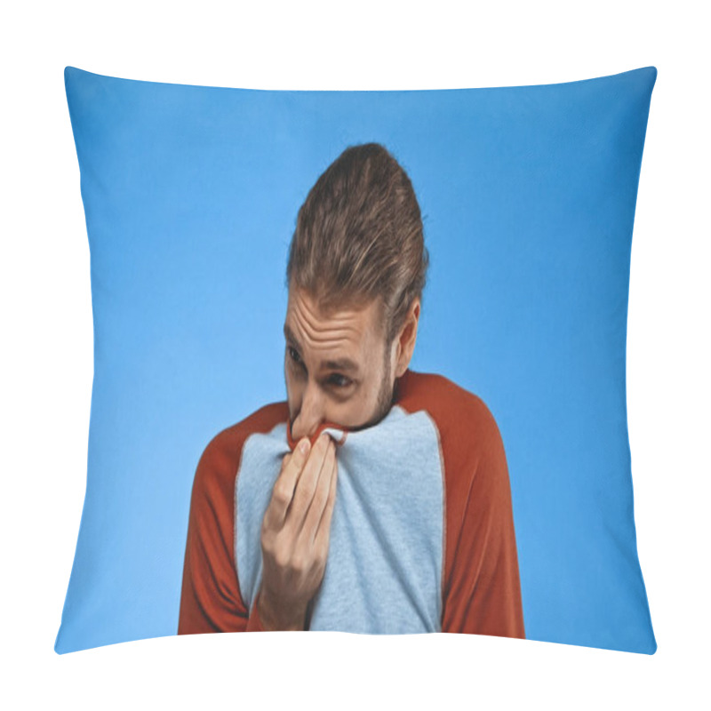 Personality  Man Covering Nose With Shirt While Feeling Unpleasant Smell On Blue Pillow Covers