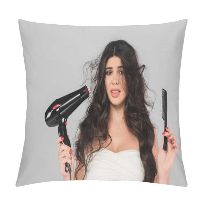 Personality  Upset Woman With Damaged And Tousled Hair Holding Comb And Hair Dryer While Looking At Camera Isolated On Grey Pillow Covers