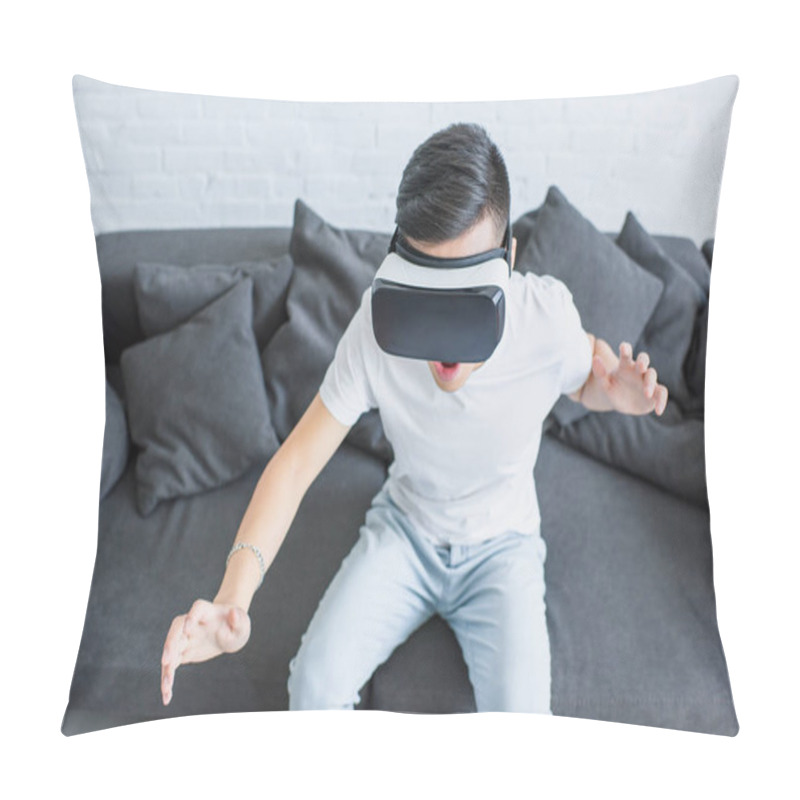 Personality  High Angle View Of Emotional Young Man Sitting On Couch And Using Virtual Reality Headset Pillow Covers