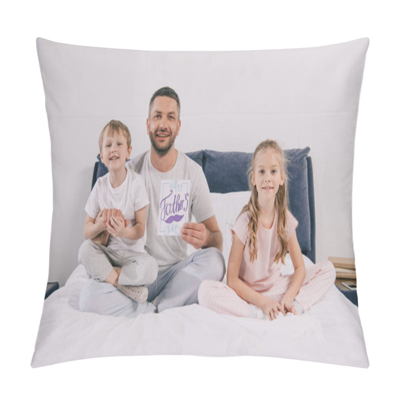 Personality  Happy Dad Holding Fathers Day Greeting Card While Sitting On Bedding Near Adorable Kids Pillow Covers