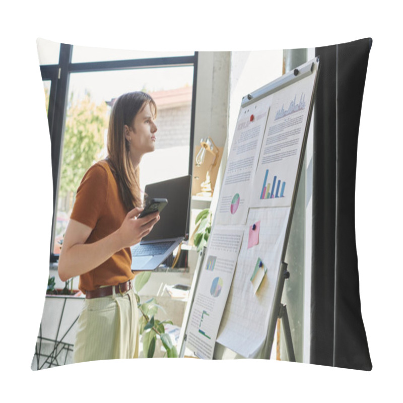 Personality  A Focused Young Non Binary Individual Analyzes Data Presentations In A Modern Office. Pillow Covers