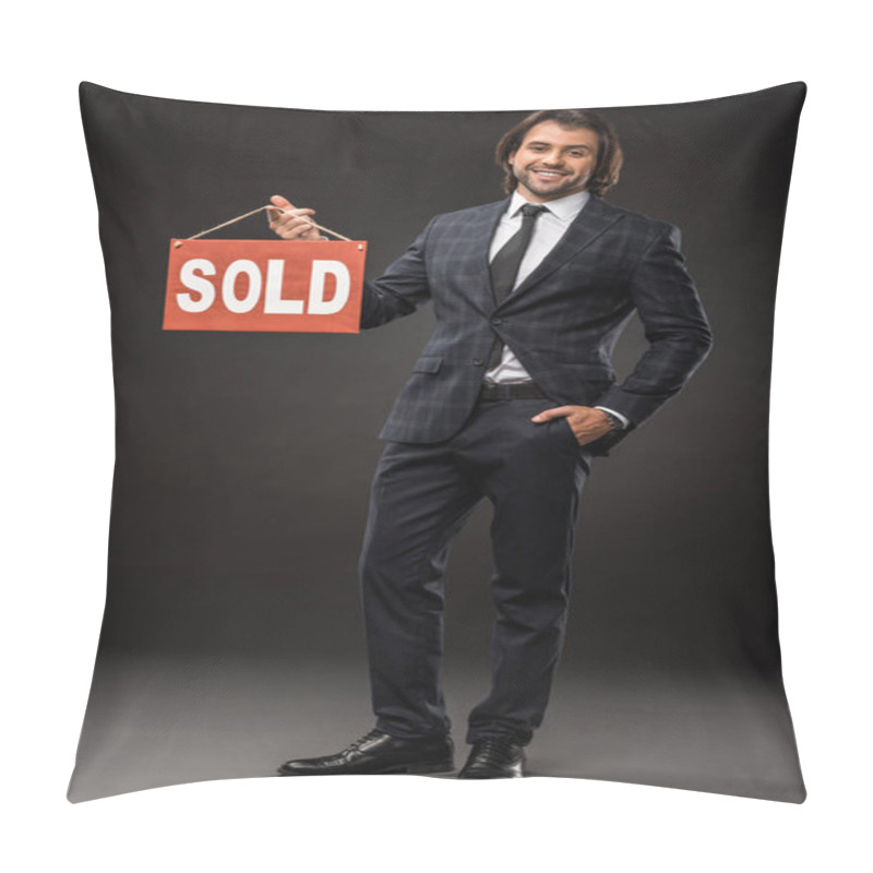 Personality  Handsome Young Businessman Holding Sold Sign And Smiling At Camera On Black Pillow Covers