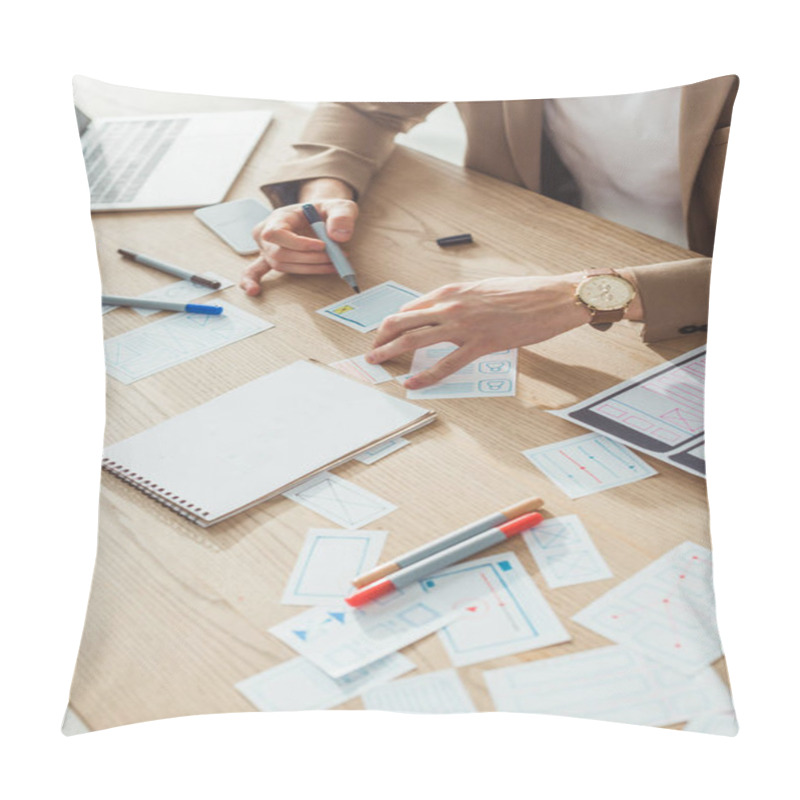 Personality  Cropped View Of Designer Developing App Layouts Beside Mobile Wireframe Sketches On Table Pillow Covers