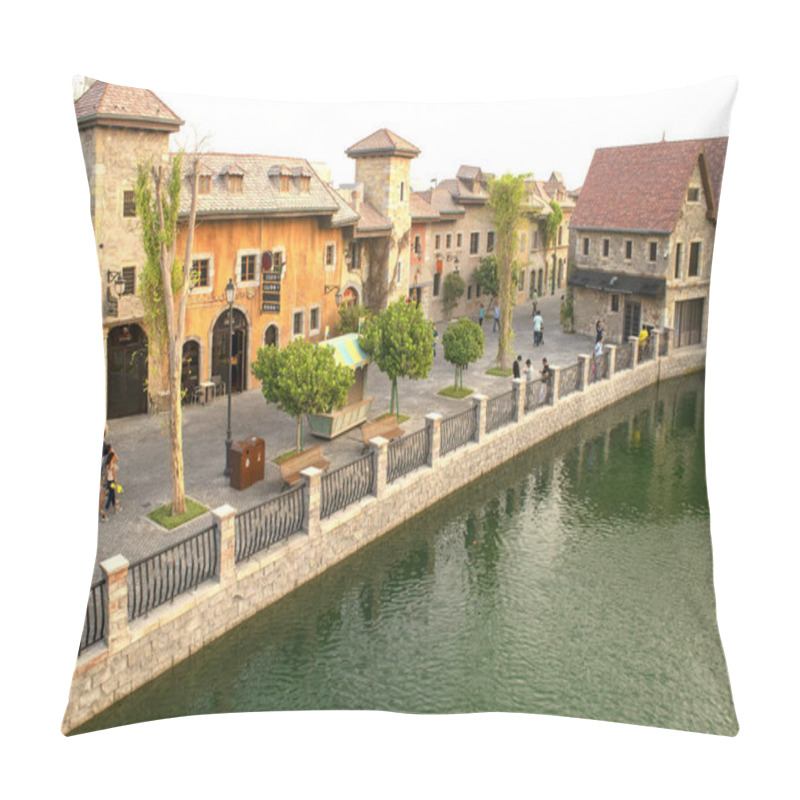 Personality  Dubai / UAE - October 11, 2019:  View Of Riverland Buildings Along The Street With Many People Around Pillow Covers