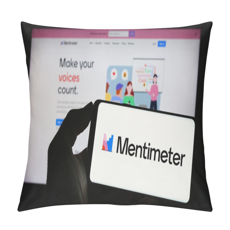 Personality  Stuttgart, Germany - 07-09-2023: Person Holding Mobile Phone With Logo Of Presentation Software Company Mentimeter On Screen In Front Of Business Web Page. Focus On Phone Display. Pillow Covers