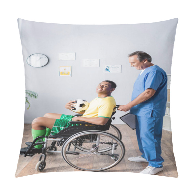 Personality  Cheerful African American Sportsman In Wheelchair Holding Football And Smiling Near Doctor  Pillow Covers